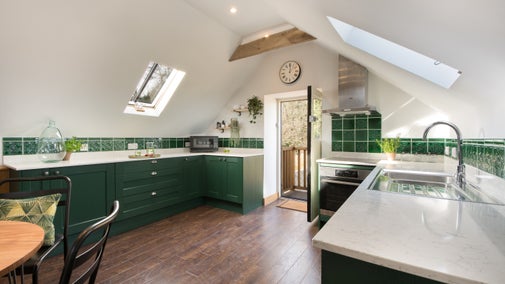 The open plan kitchen and dining room at Yew Tree Barn, Surrey